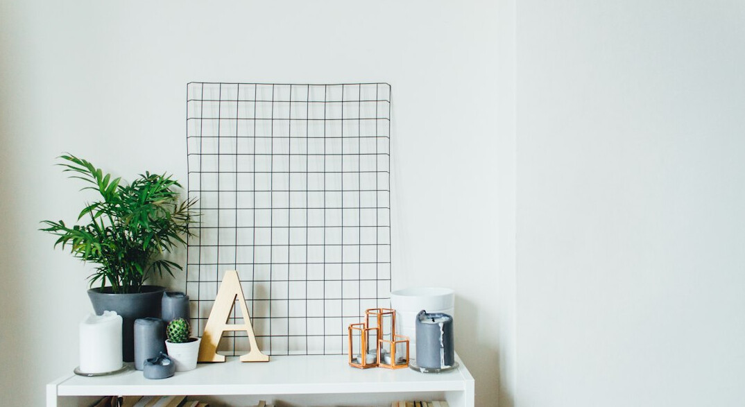 Bright open office with plants and large windows