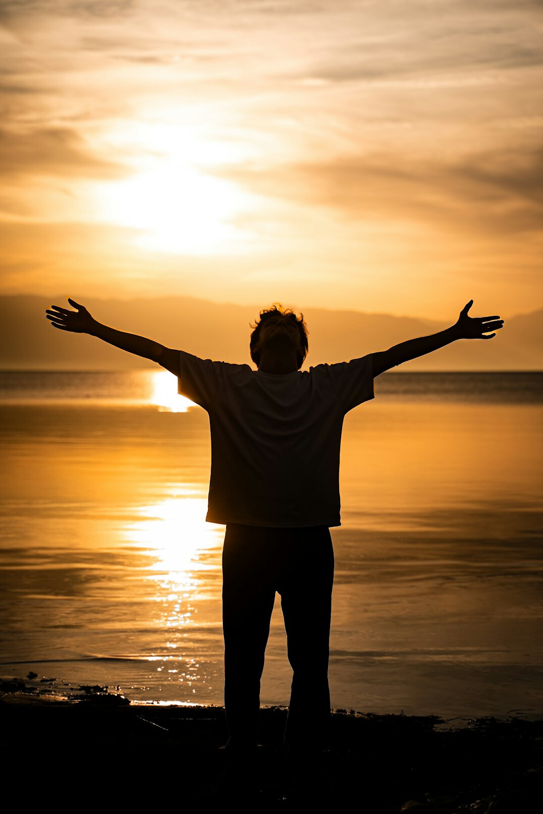 person awakening at dawn