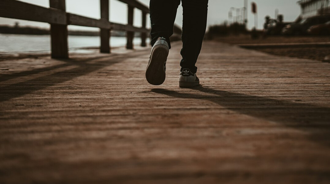 person walking path to success